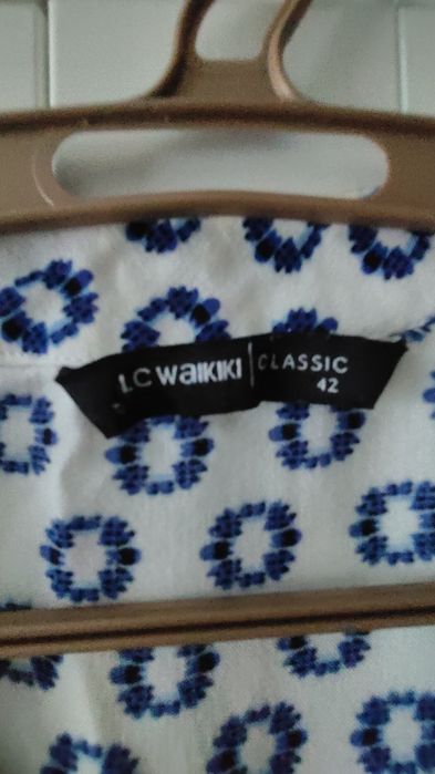 Жіноча блузка 50 розміру