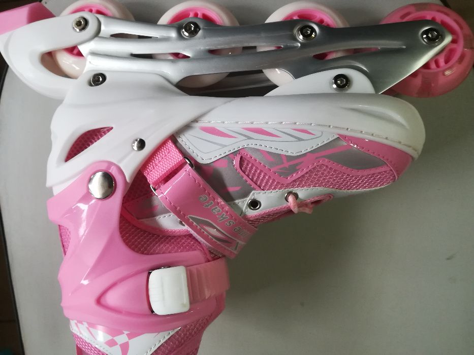 Розовые ролики 33-38. ,светящиеся колеса,алюминиевое шасси