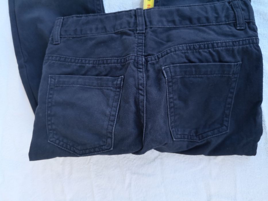 Granatowe eleganckie materiałowe regulowane spodnie h&m 134