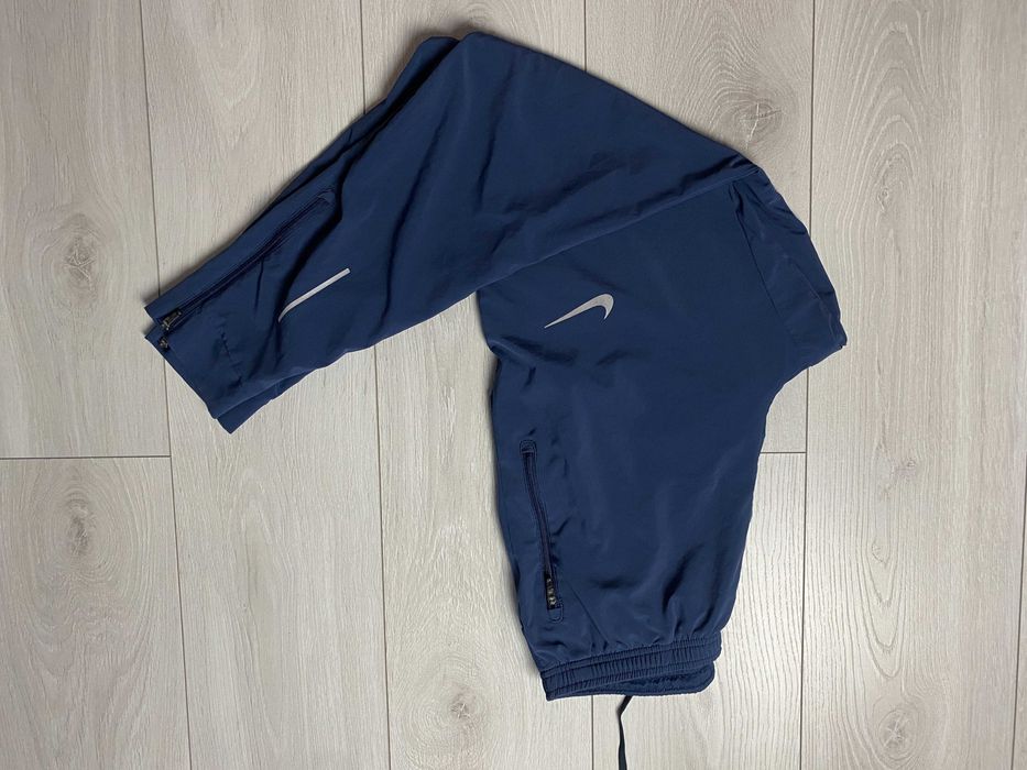 NIKE r.S oryginalne cienkie spodnie biegowe sportowe męskie stan BDB