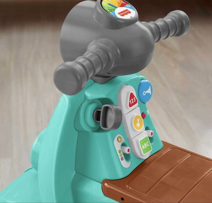 Skuter jeździk Fisher Price dźwięki