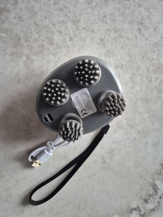 Elektryczny masażer do głowy