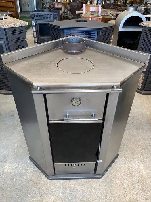 Vendo salamandra toda em inox de canto com forno e fogão pra cozinhar como nova