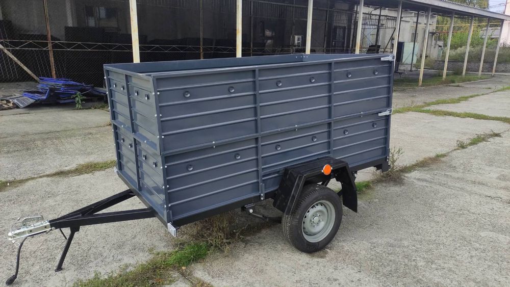 Причіп спеціалізований ПА 23 на ресорах Волга з двома бортами