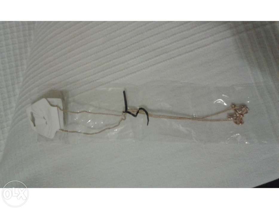 Colar Laço Dourado novo