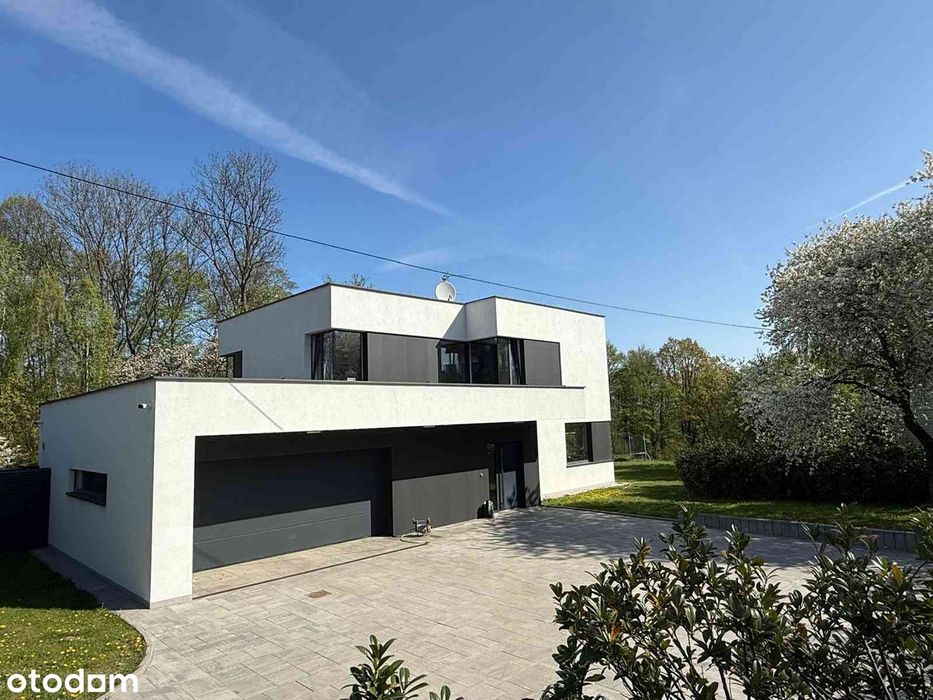 Wyjątkowa rezydencja w nowoczesnej bryle – prywatny las, 7700m² Kraków