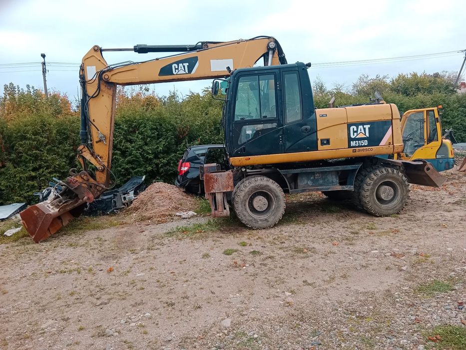 Caterpillar M315D  koparka kołowa CAT M315D M313 M316 podpory+pług, jak Volvo EW140 EW160