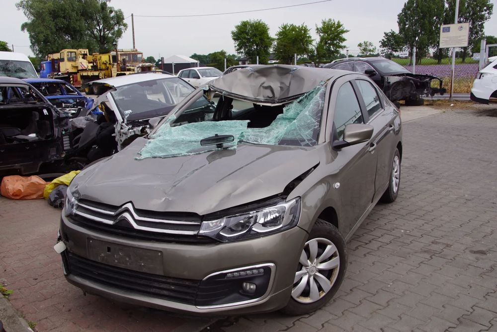 Auto na części - Citroen C-Elysee Lift 1.6 BlueHDI 99 KM BH02 20ET30 KEB 2018R Silnik Skrzynia Drzwi Błotnik Klapa Zderzak Lampa Lusterko Klamka Szyba Deska Kokpit Sterownik Moduł Czujnik Licznik Panel Kierownica