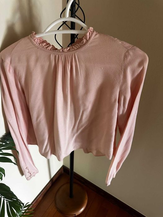 Blusa rosa claro