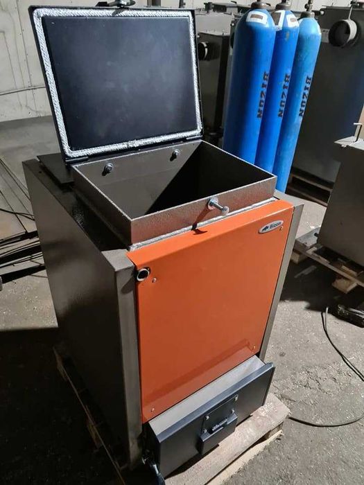 Котел  шахтный на дровах.6,8,10,12,15,20,25-100 КвТ.Котел Холмова