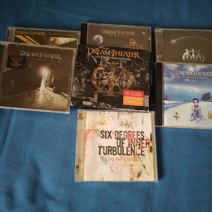 CDs Dream Theater, Aerosmith, Pearl Jam e outros