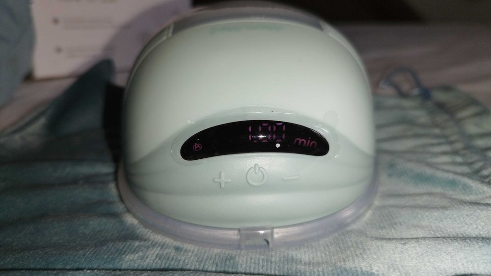 Extrator leite mãos livres63824709134979123