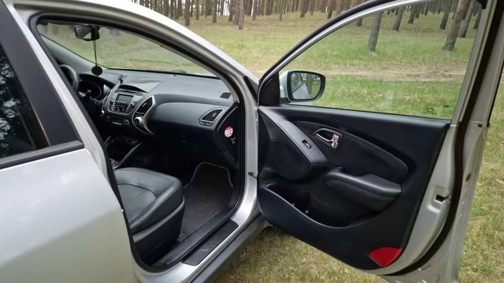 Hyundai ix35 2011 VIN TMAJU81BCCJ250651 фото оголошення 18 з 24