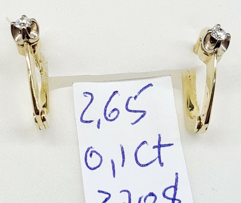 Продам золотые серьги с бриллиантами