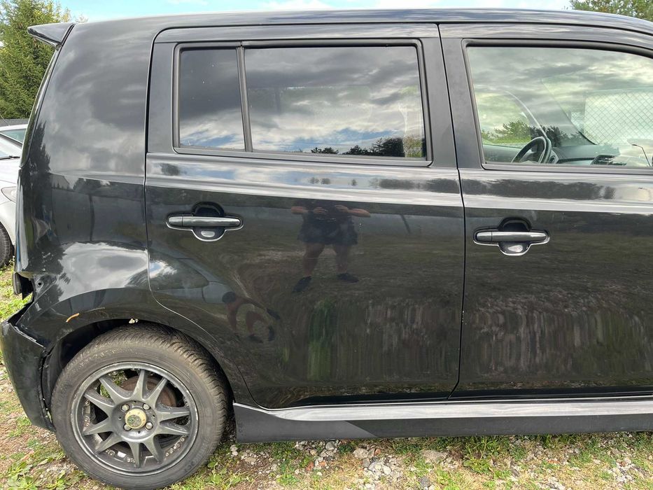 drzwi tył tylne tylnie prawe daihatsu materia x07 czarne 2006 - 2011
