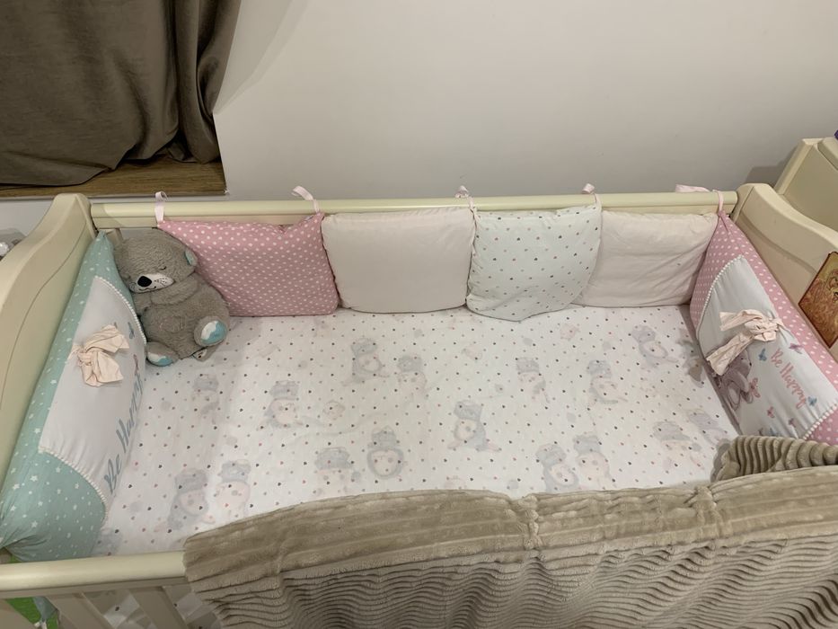 Бортики-подушечки в ліжечко