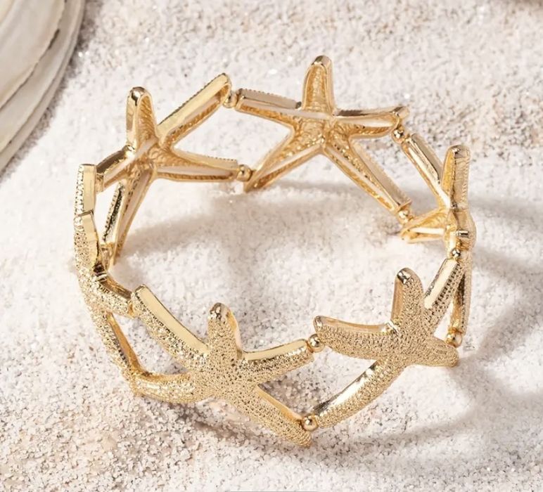 Pulseira em dourado de estrela