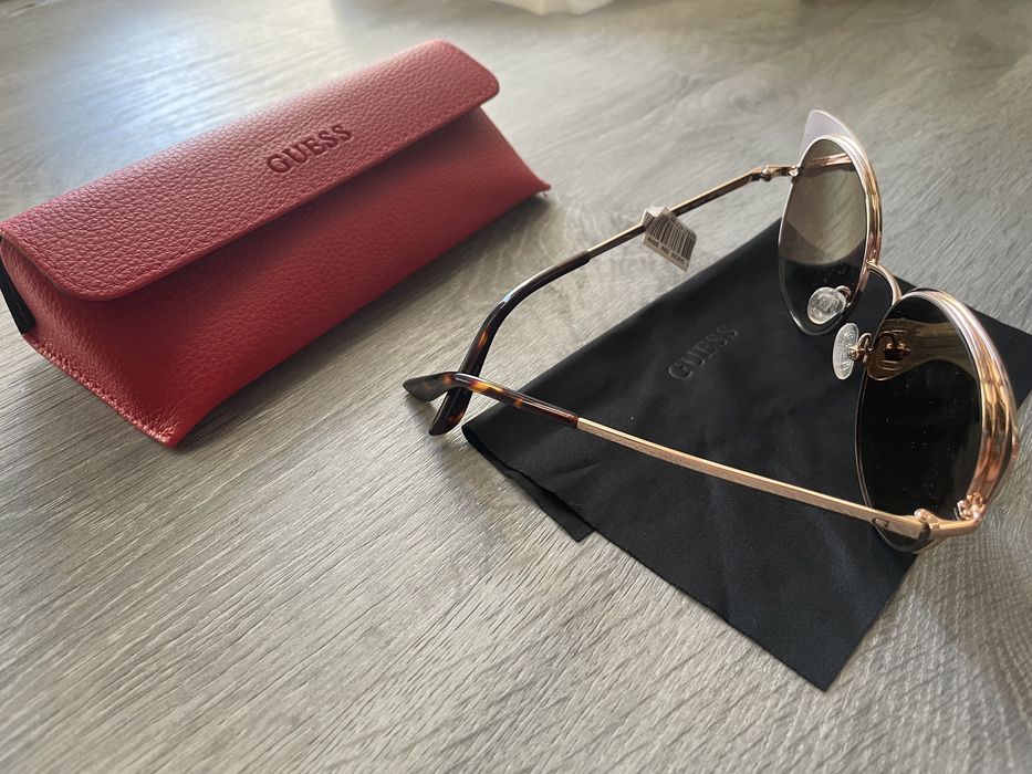 Guess óculos de sol, olho de gato dourados