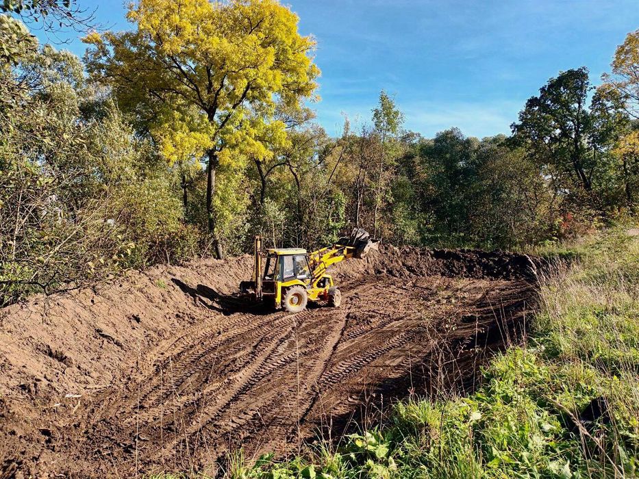Екскаватор навантажувач Послуги