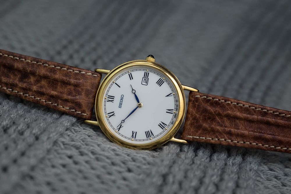 Zegarek Seiko kwarcowy, złoty do garnituru