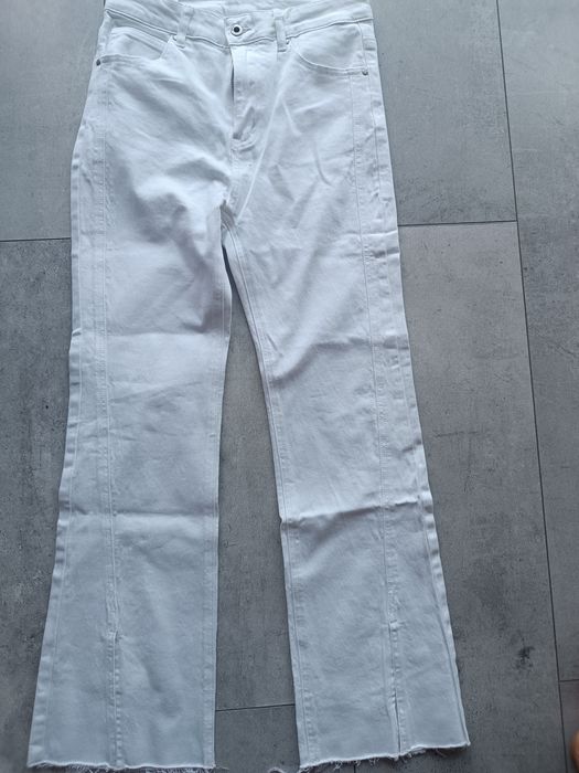 Białe spodnie nowe XL