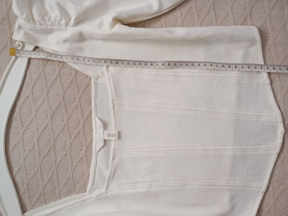 H&M r.M efektowny biały top gorsetowy bufiasty rękaw