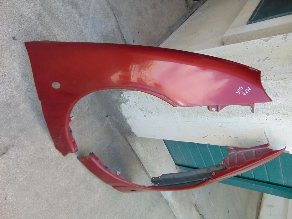 Mazda MX3 guarda lamas