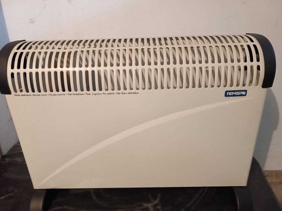 Aquecedor eléctrico em excelente estado.