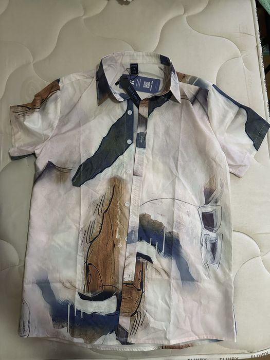 Camisas estampadas o preço é por todas elas