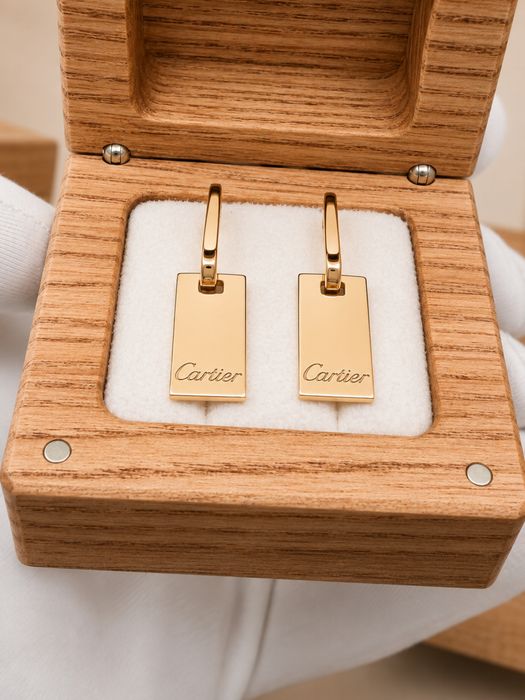 Золоті сережки 585 cartier вагою 6,6 г.