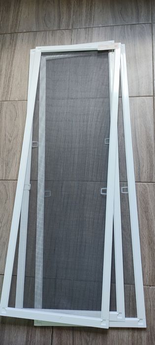 Новые москитные сетки . Цена за три шт.