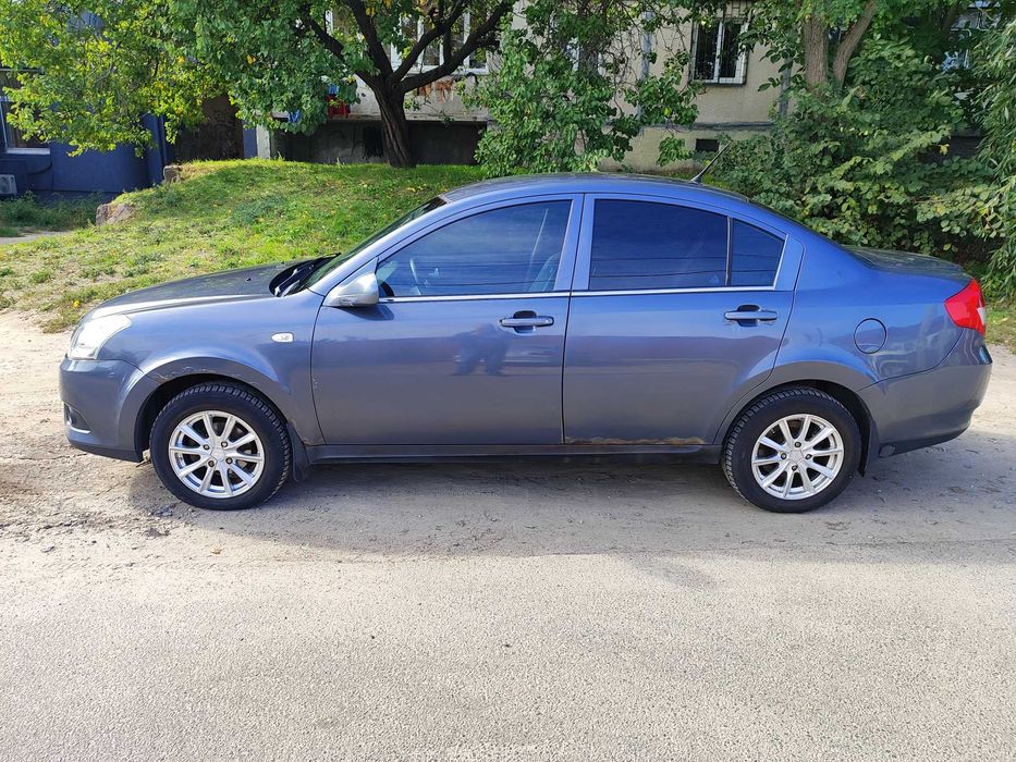 Авто Chery E5