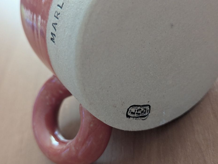 Nowy, ceramiczny kubek z uchem