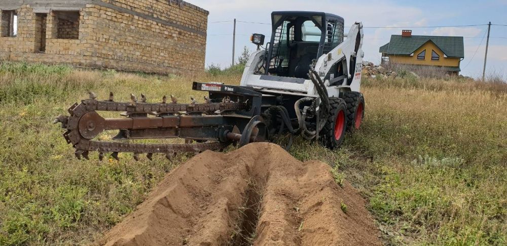 Аренда, услуги мини-погрузчика Bobcat, ковш, бур, траншеекопатель, вил