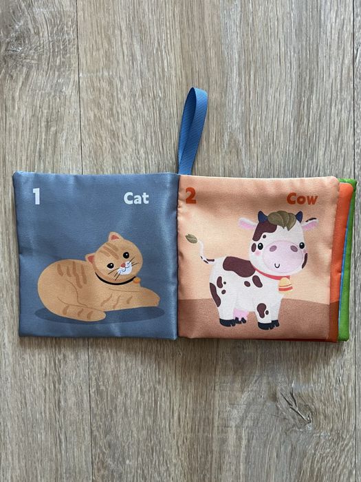 Книжка шуршалка  тваринки нова