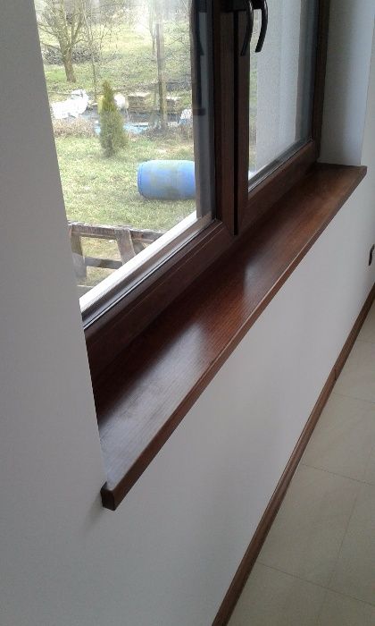 Schody drewniane samonośne i na beton.parapety drewniane.