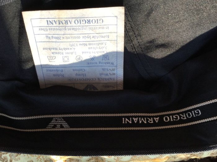 Nowe spodnie do garnituru Armani rozmiar 31