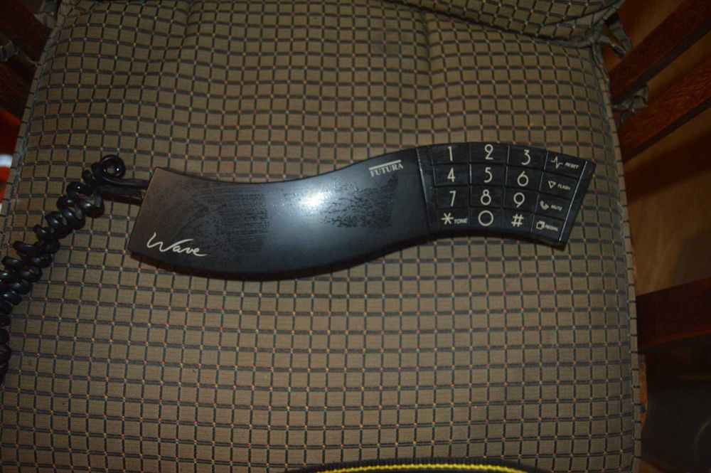 Telefone em forma de TIL