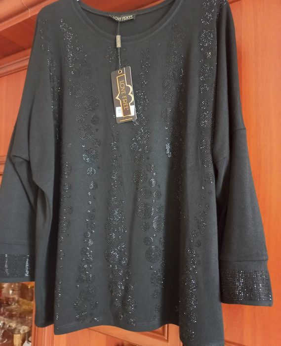 Нарядна трикотажна кофтина.