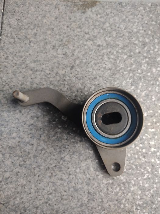 Napinacz ,rolka, paska rozrządu 1, 7 TDS