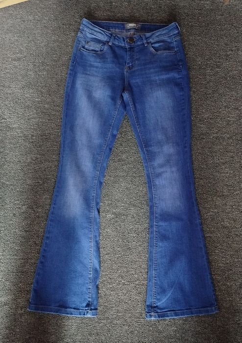 Flared jeans,джинси кльош