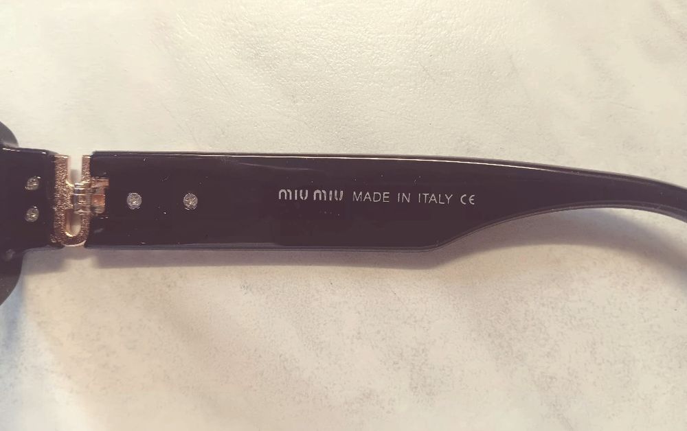 Óculos de sol miumiu