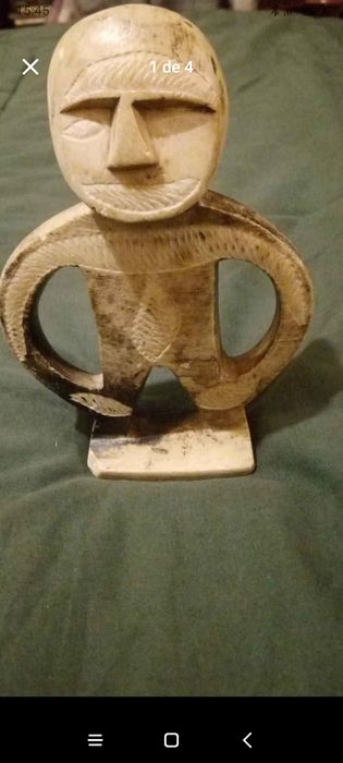 Boneco de pedra para enfeitar