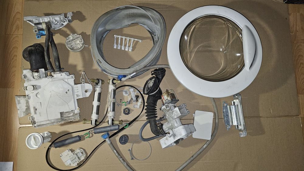 Części zamienne do pralki Electrolux EWF 1005 drzwiczki wąż sprężyna