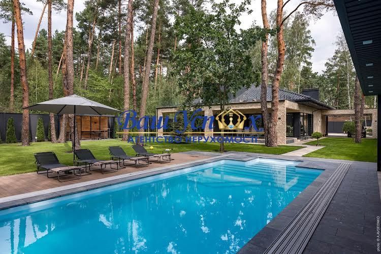 Продаж нового сучасного будинку з басейном в лісі. Плюти