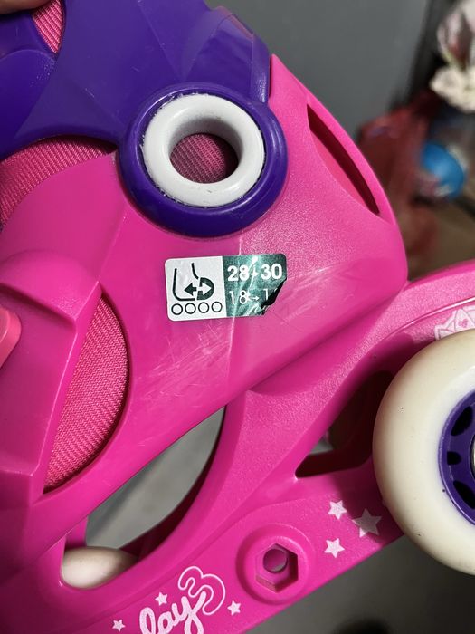 Patins em linha rosa