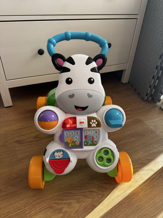 Pchacz jezdzik fisher price zebra