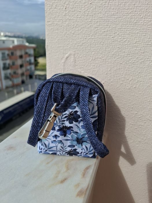 Porta moedas mochila