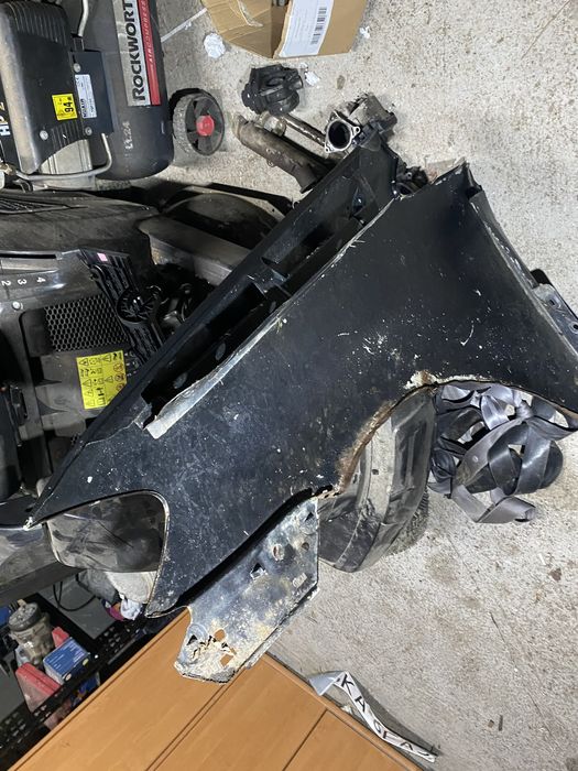 Błotnik przód prawy VW Touran lift 06-10r czarny