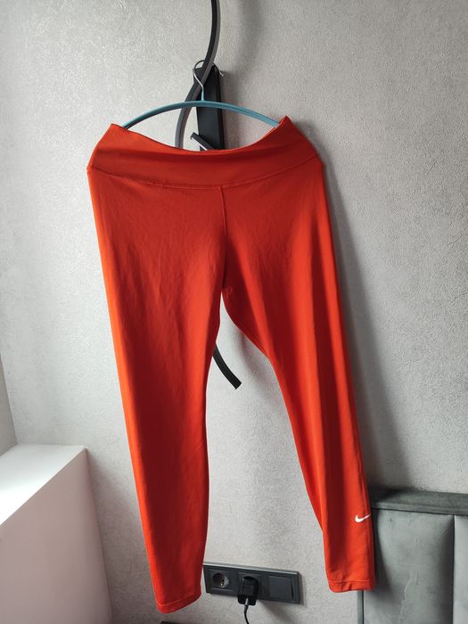 Лосини Nike з карманом помаранчеві Л